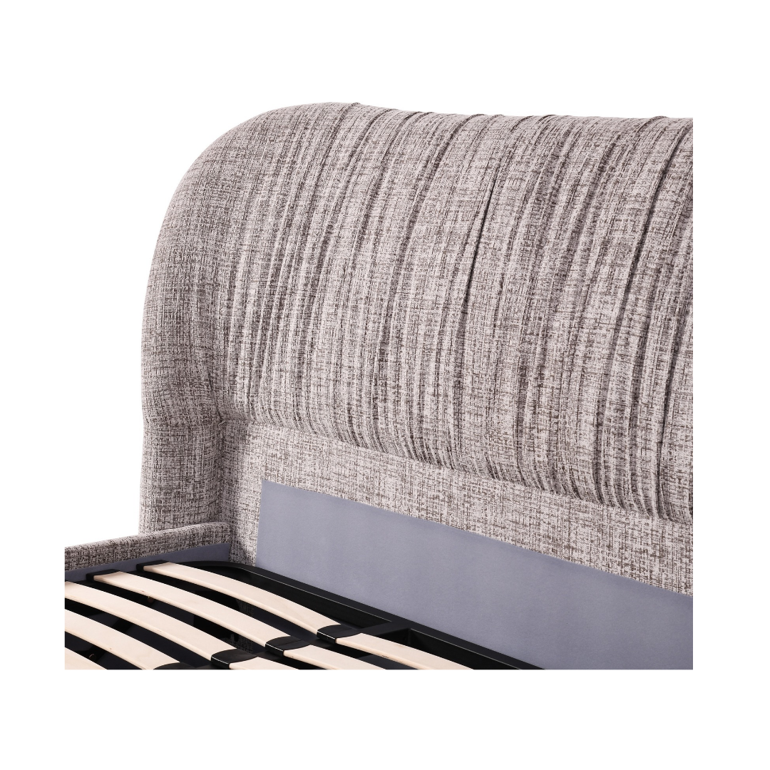 Close-up of the Astrid Queen Gaslift Storage Bed's curved headboard showing the light grey woven fabric texture and vertical channel stitching detail