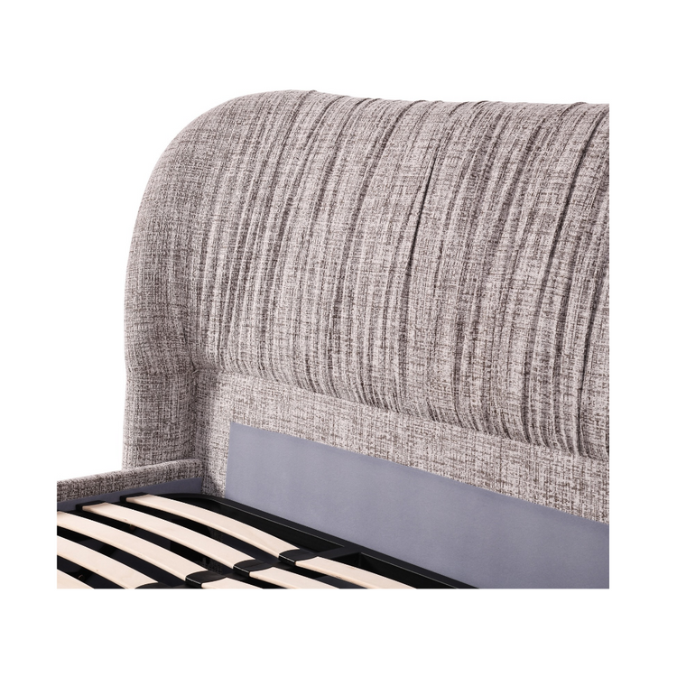 Close-up of the Astrid Queen Gaslift Storage Bed's curved headboard showing the light grey woven fabric texture and vertical channel stitching detail