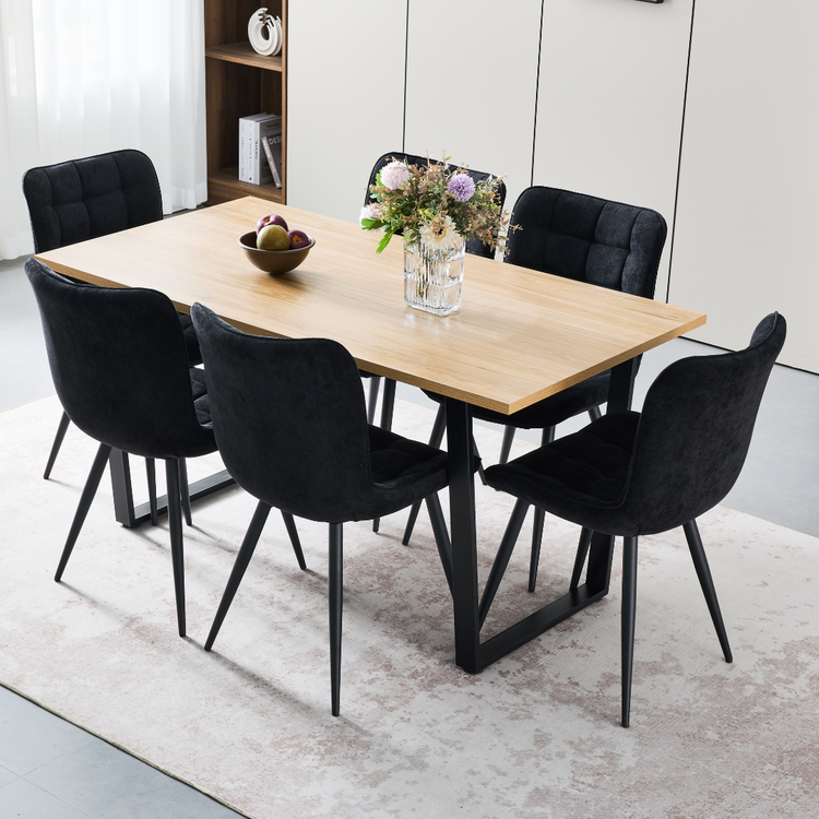 Elden 6-seater dining set with natural oak-look 1.5m tabletop and six black padded chairs on a neutral rug.