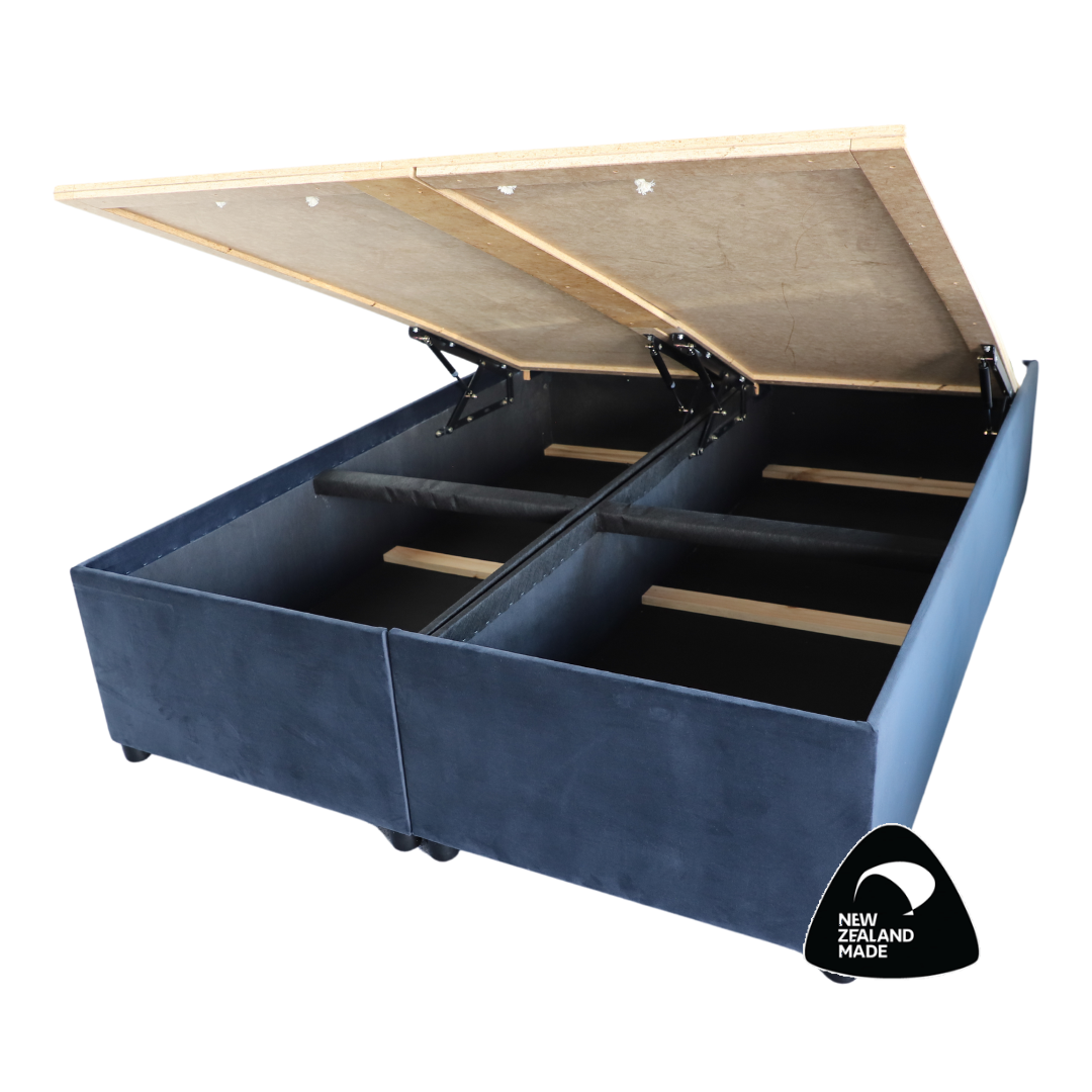 NZ Made Gaslift Storage Bed Base in black velvet fabric – hydraulic lift open to reveal hidden storage space.