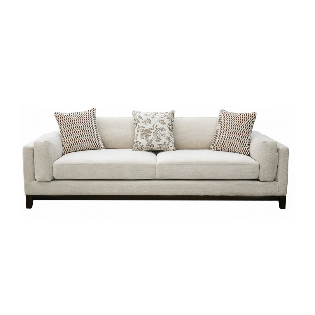 Klint 3-seater sofa cream woven fabric with three decorative cushions and dark walnut timber legs, NZ Furniture Warehouse