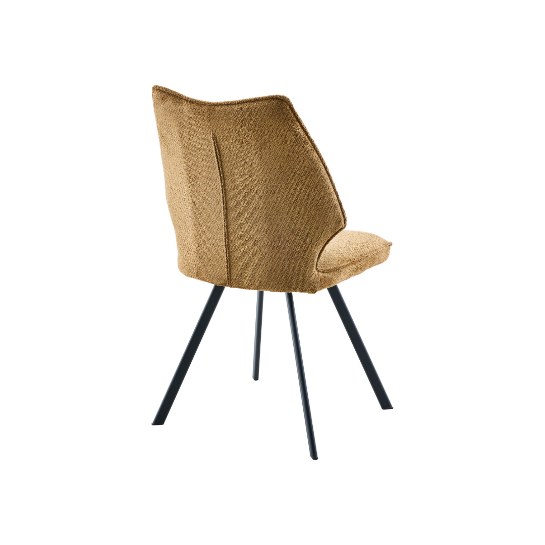 Close-up of the rich, warm [Tan/Brown] textured fabric upholstery on Korven chair