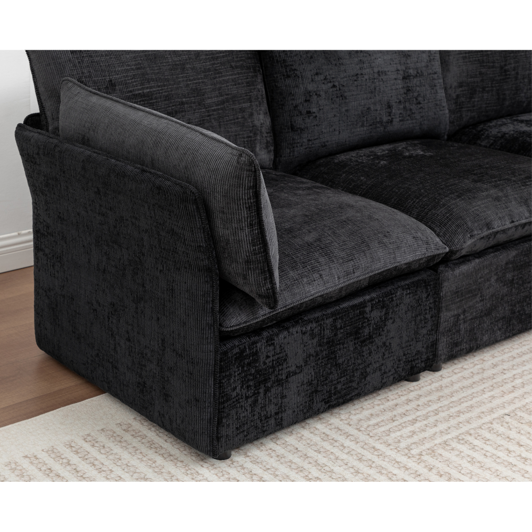 Side arms of Lira Black Modular Sofa showing deep seating and low-profile design
