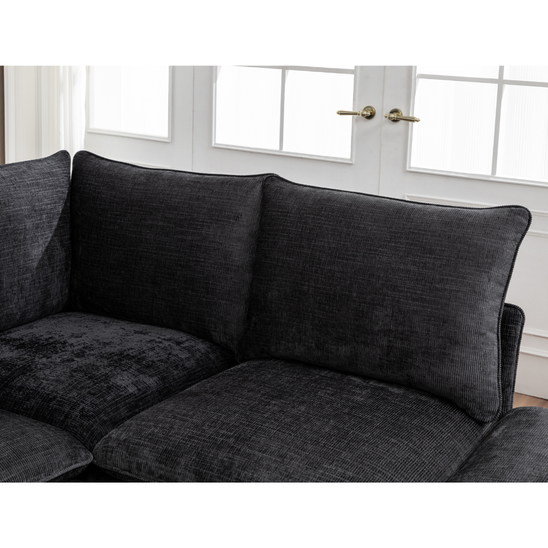 Close-up of the luxurious textured black fabric on the Lira Modular Sofa