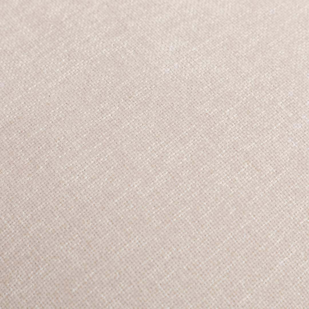 Close-up of the soft, textured beige fabric on the Luno Swivel Chair.