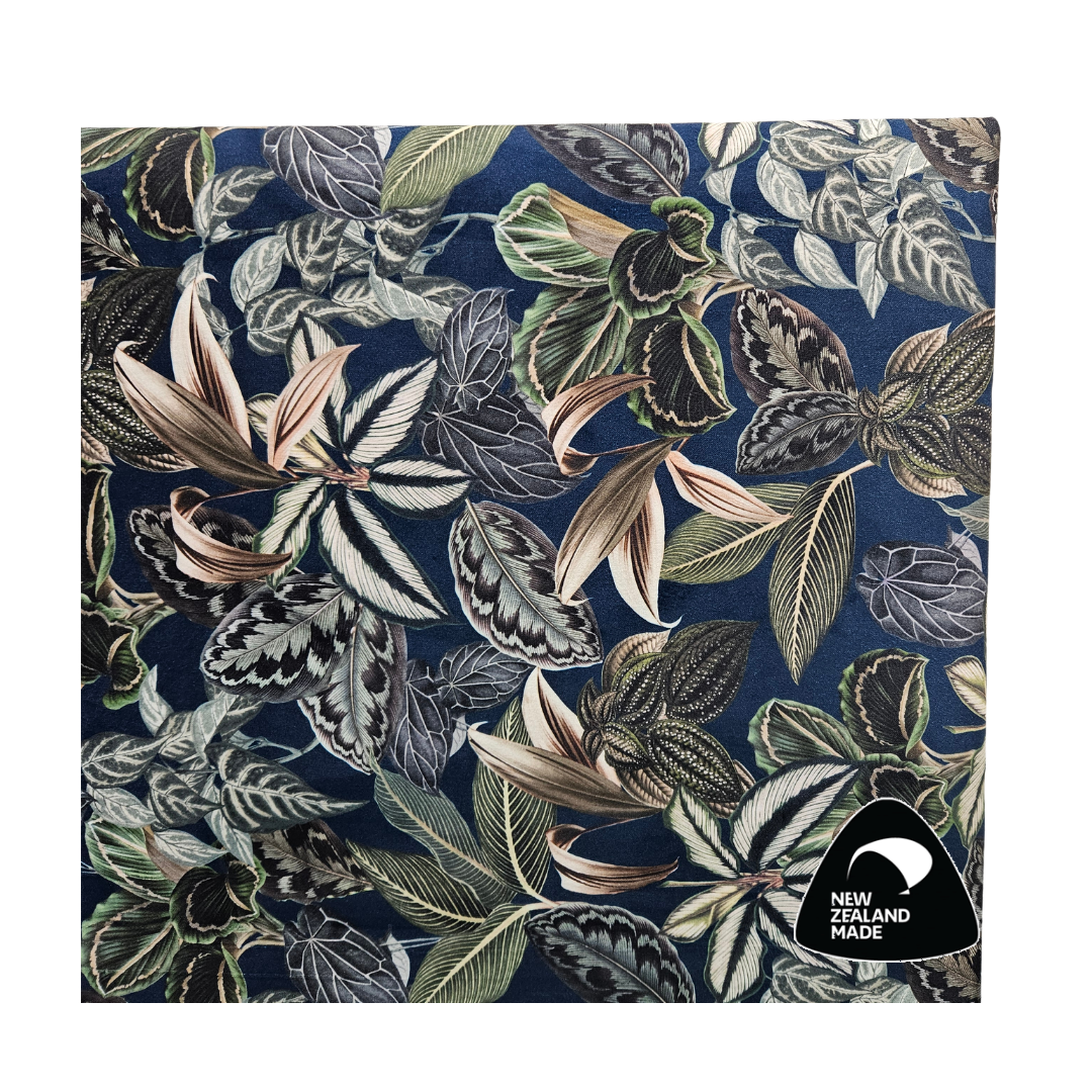 Close-up of McKenzie Headboard showcasing Warwick velvet texture and botanical pattern.