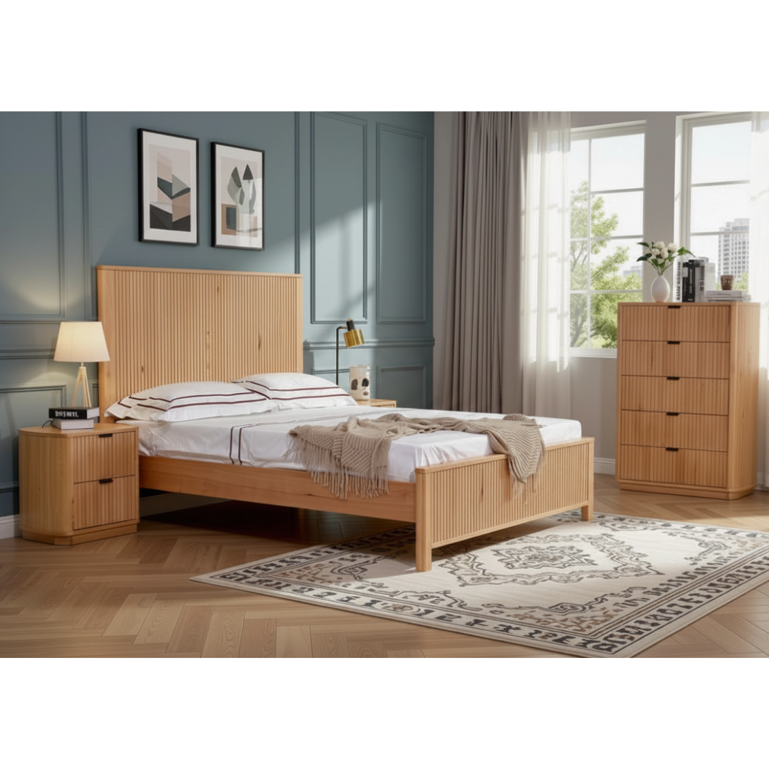 Nara bedroom suite natural messmate timber — queen bed frame with tall vertical ribbed panel headboard, matching bedside tables and tallboy in a Japandi-styled bedroom, NZ Furniture Warehouse Penrose Auckland