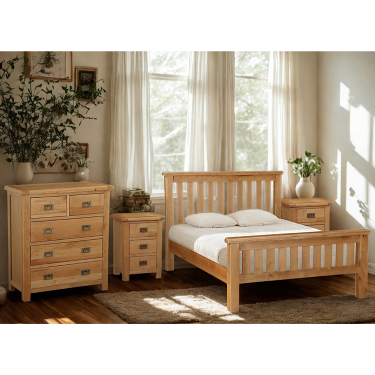 Oak wood bedroom furniture set with bed, chest of drawers, and bedsides.