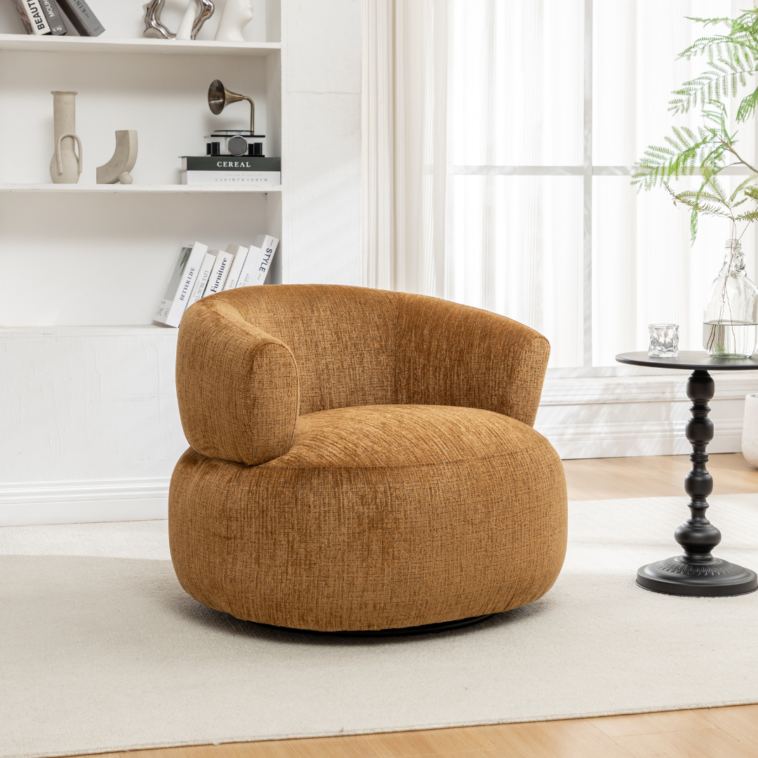 Mustard Orbit swivel chair with a rounded, cocoon-like design in a living room setting.