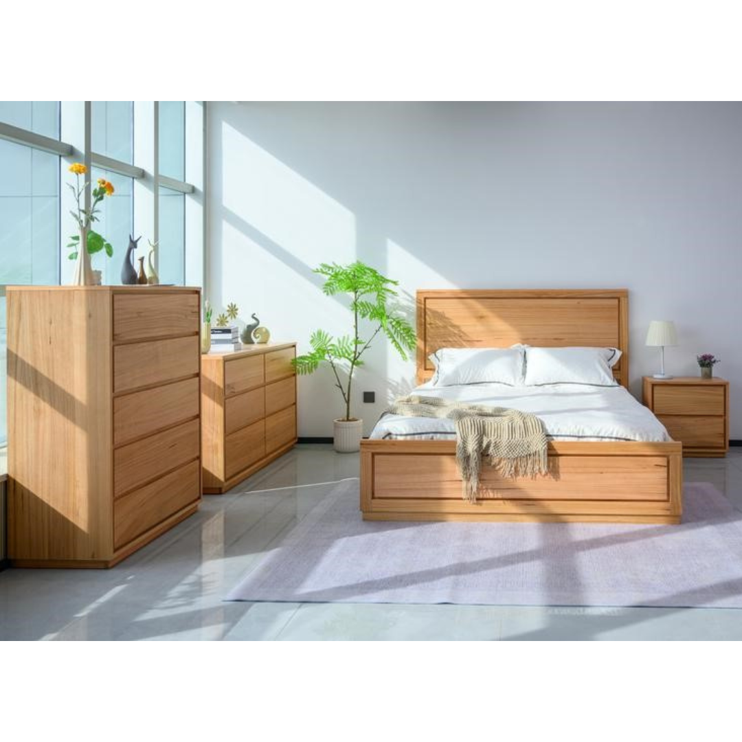 Bedroom furniture set in messmate timber featuring storage bed, tallboy, dresser, and bedside tables.