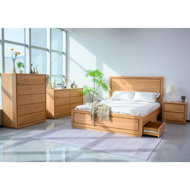 Bedroom furniture set in messmate timber featuring storage bed, tallboy, dresser, and bedside tables.