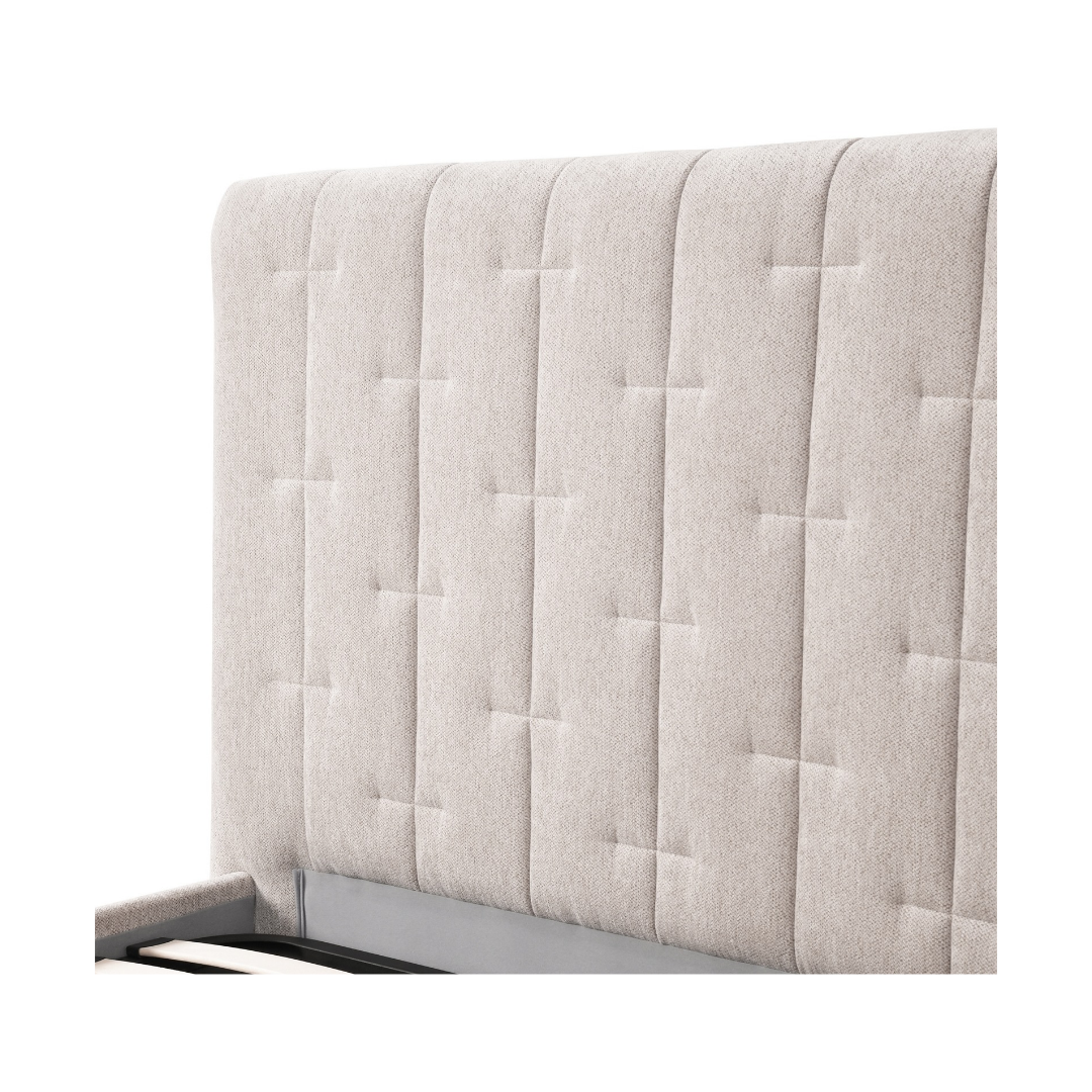 Close-up of the Soren Queen Gaslift Storage Bed's headboard showing the vertical channel stitching, cross-stitched detailing, and light oatmeal fabric texture